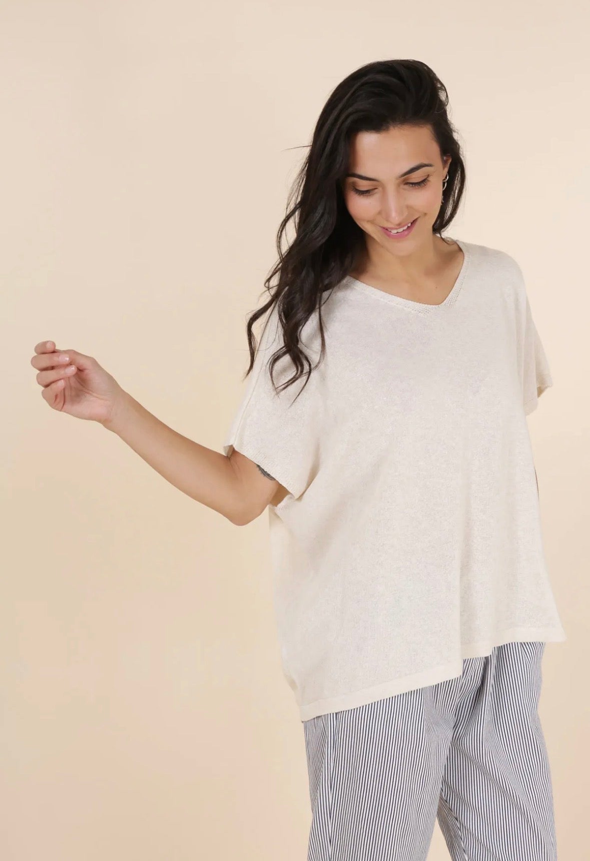 Woman wearing a white sweater