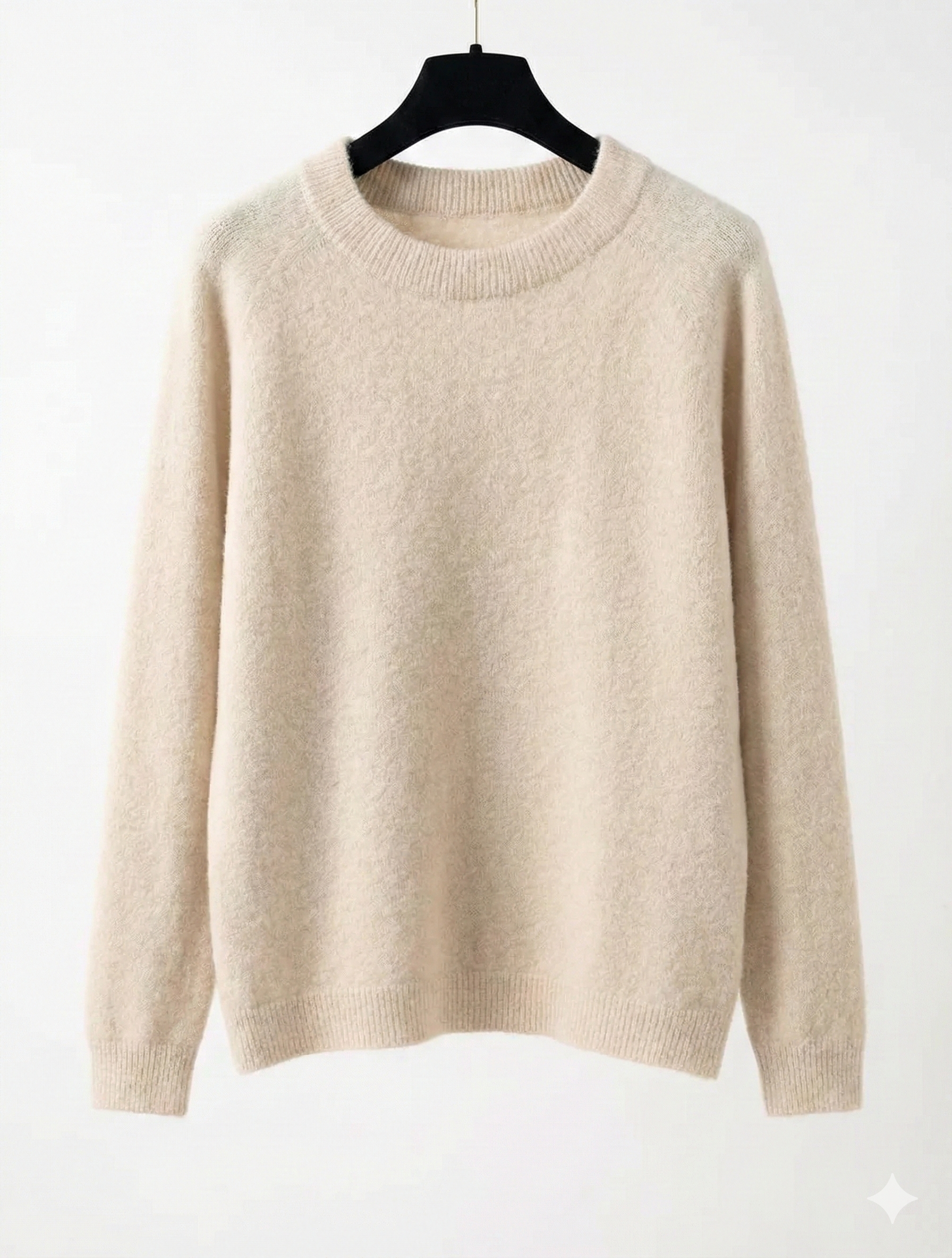 Beige sweater on a hanger against a white background