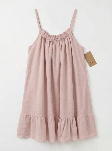 Pink top with thin straps on a white background