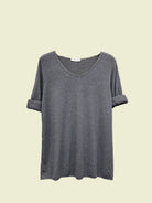 Grey top with long sleeves and v neck