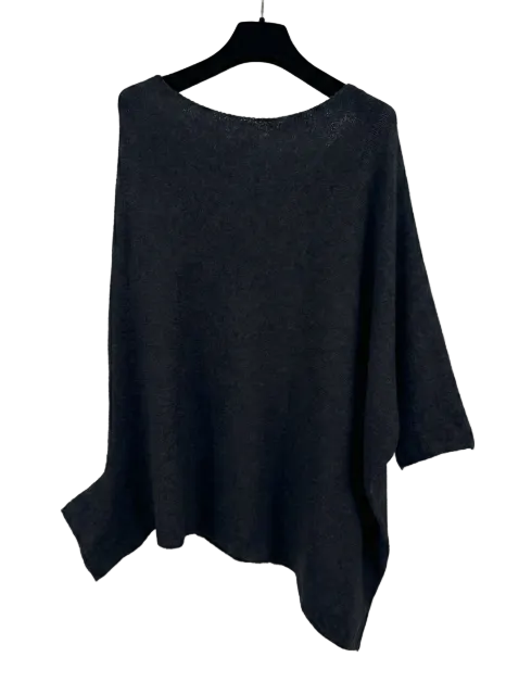 Black sweater on a hanger against a white background