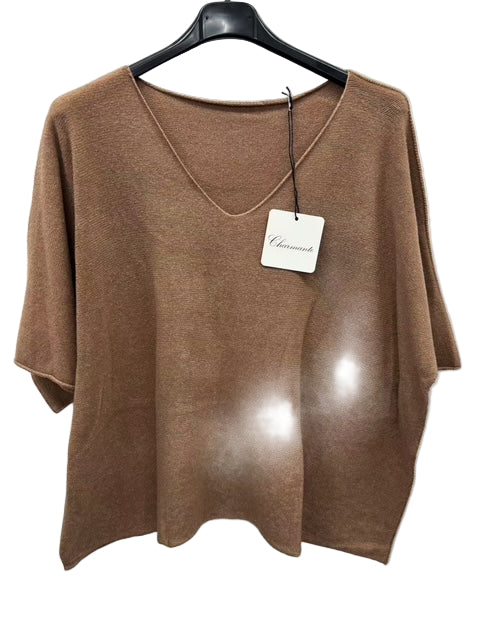 Brown sweater on a hanger with a visible brand tag against a white background