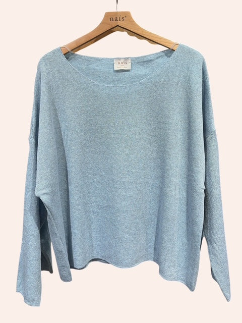 Light blue sweater on a hanger with 'nais' label against a white background