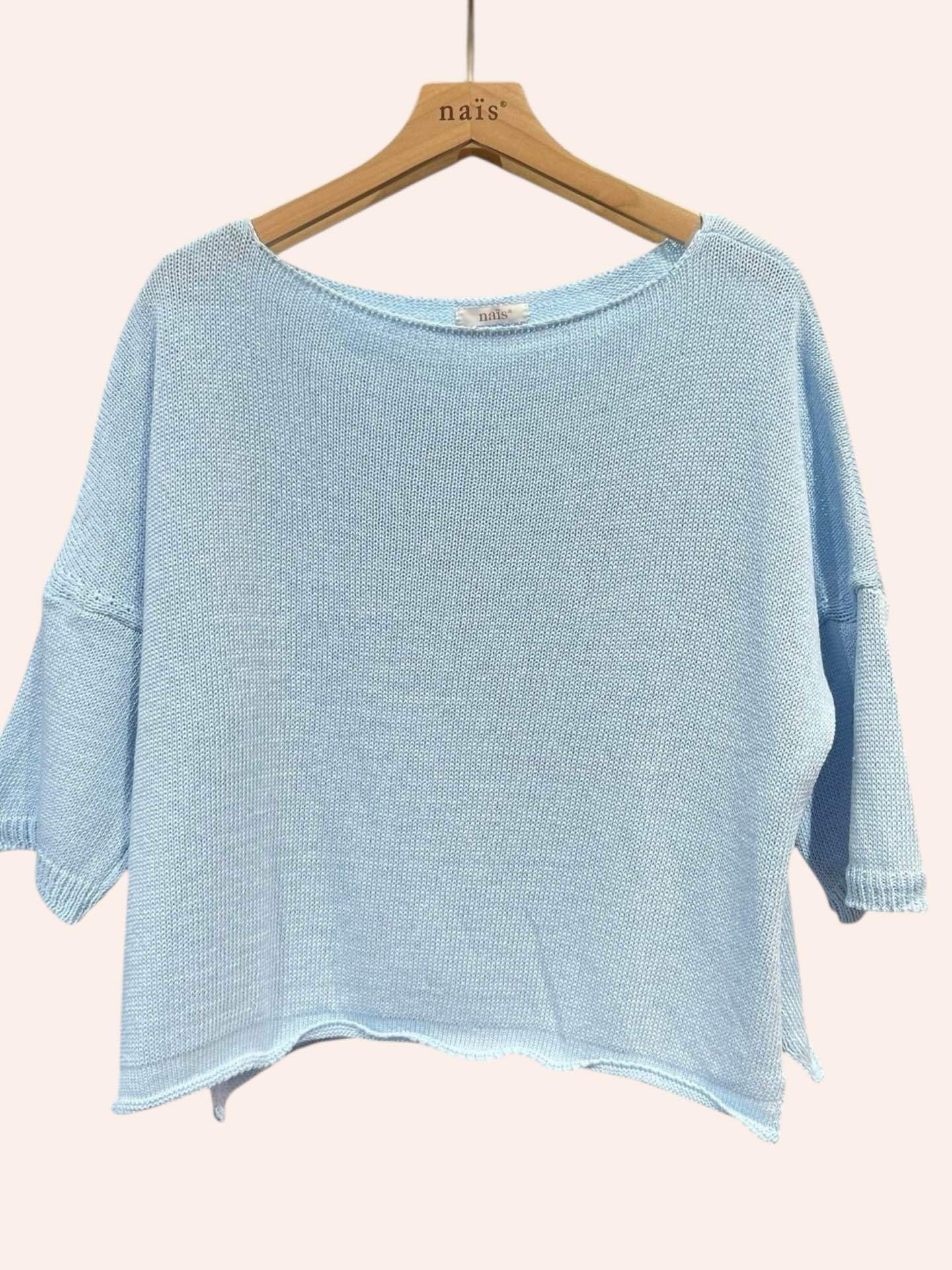 Light blue sweater on a hanger with 'nais' brand visible