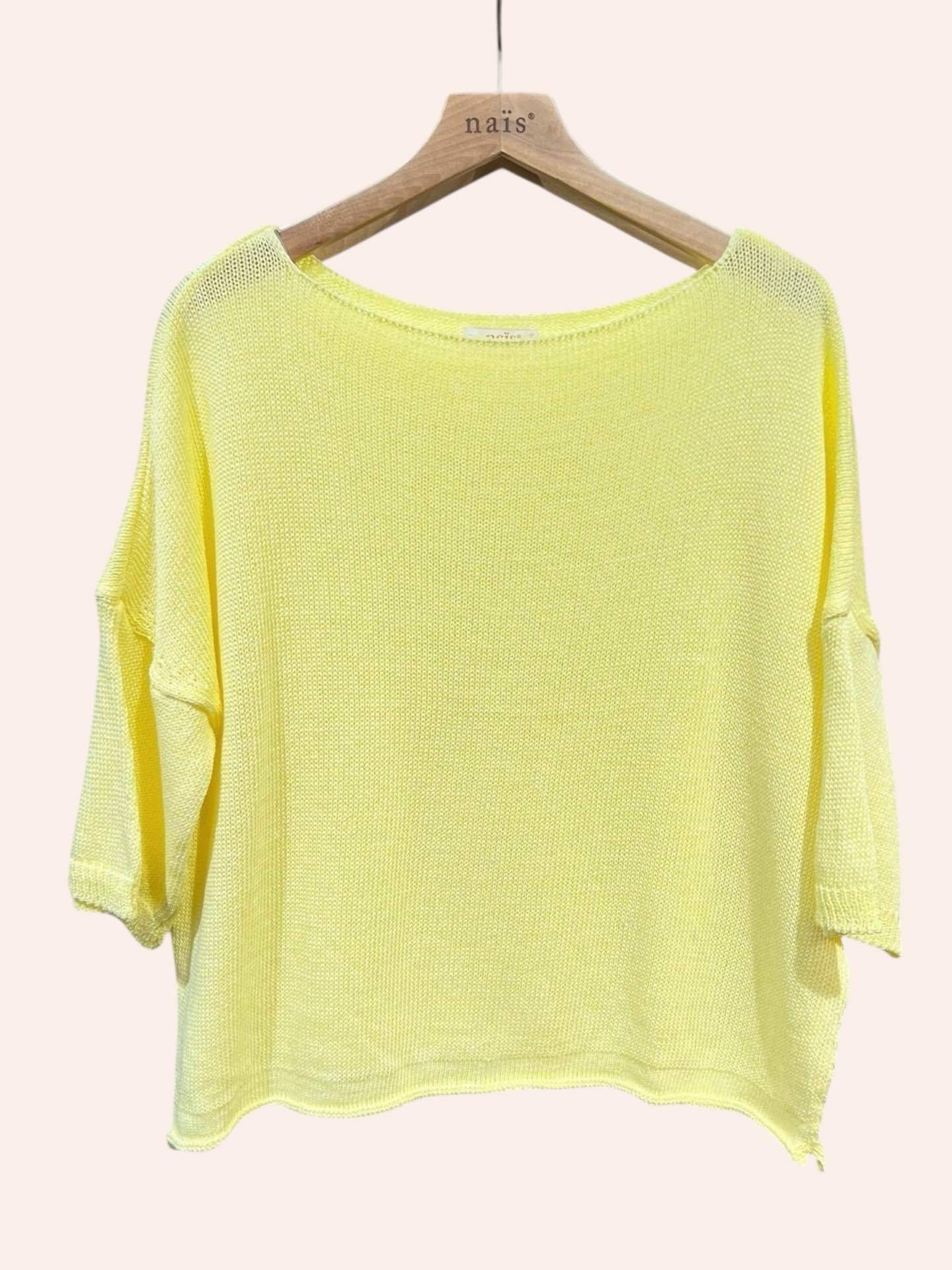 Yellow knit top on a hanger with 'nails' brand visible