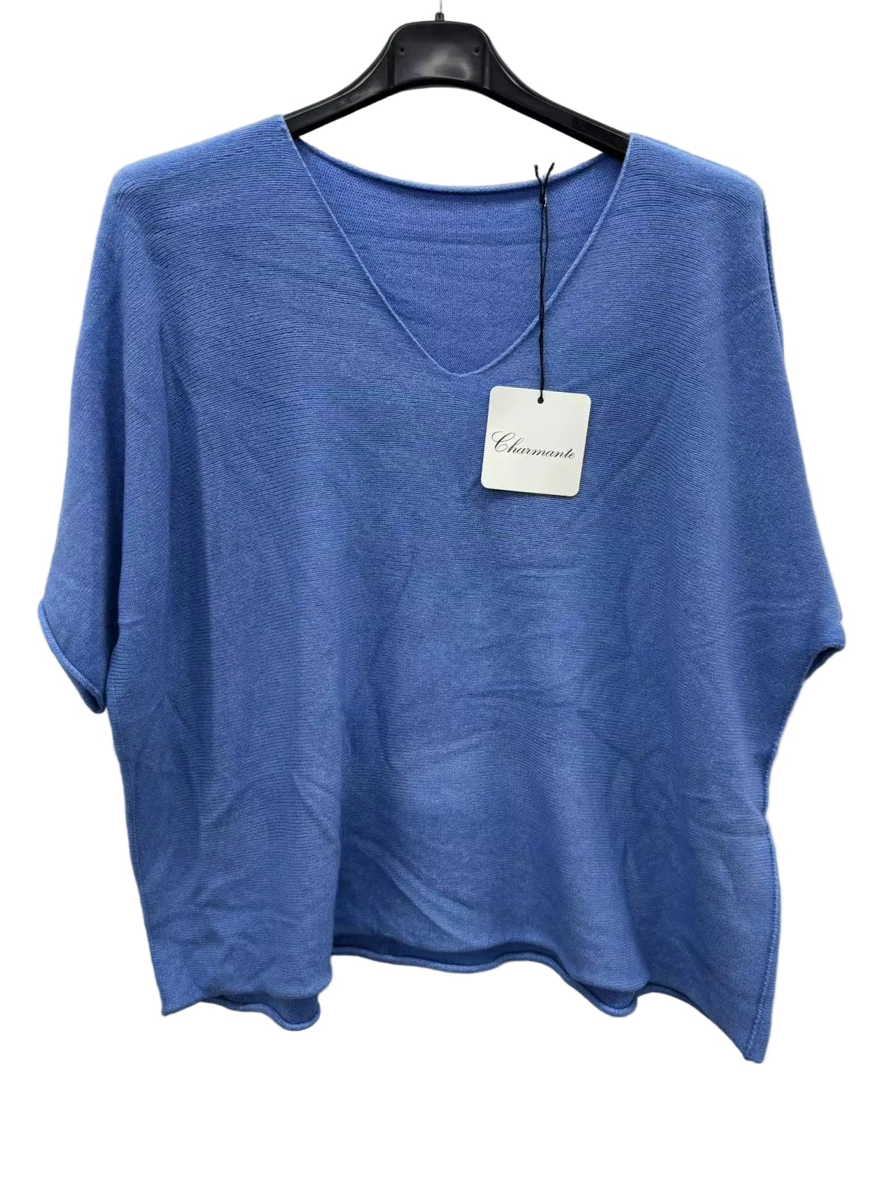 Blue sweater on a hanger 