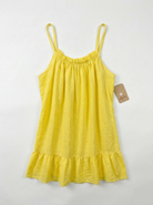 Yellow cami top with a tag on a white background