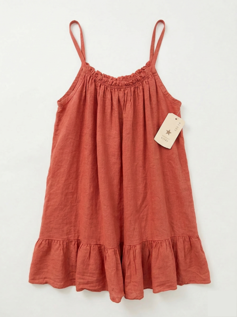 Rosewood cami top with a tag on a white background