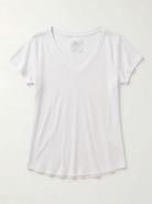 White t-shirt on a light gray background