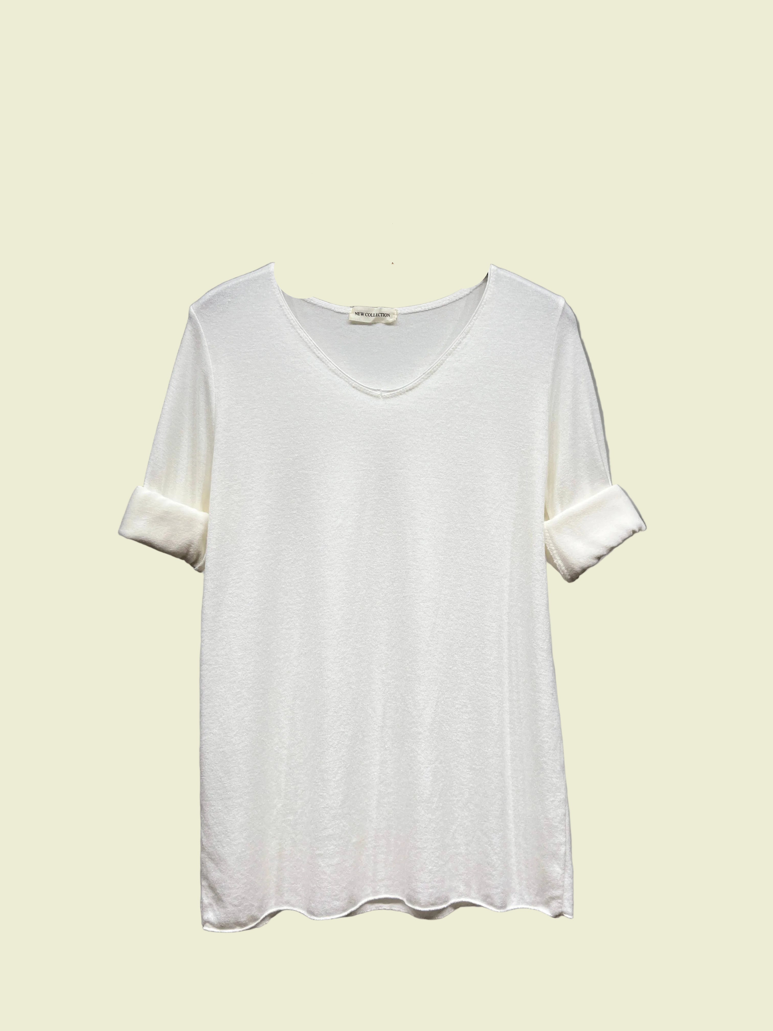 White long sleeve top with v neck