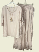 Beige outfit with a shirt and pants 