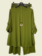 Green outfit two piece outfit trousers and top