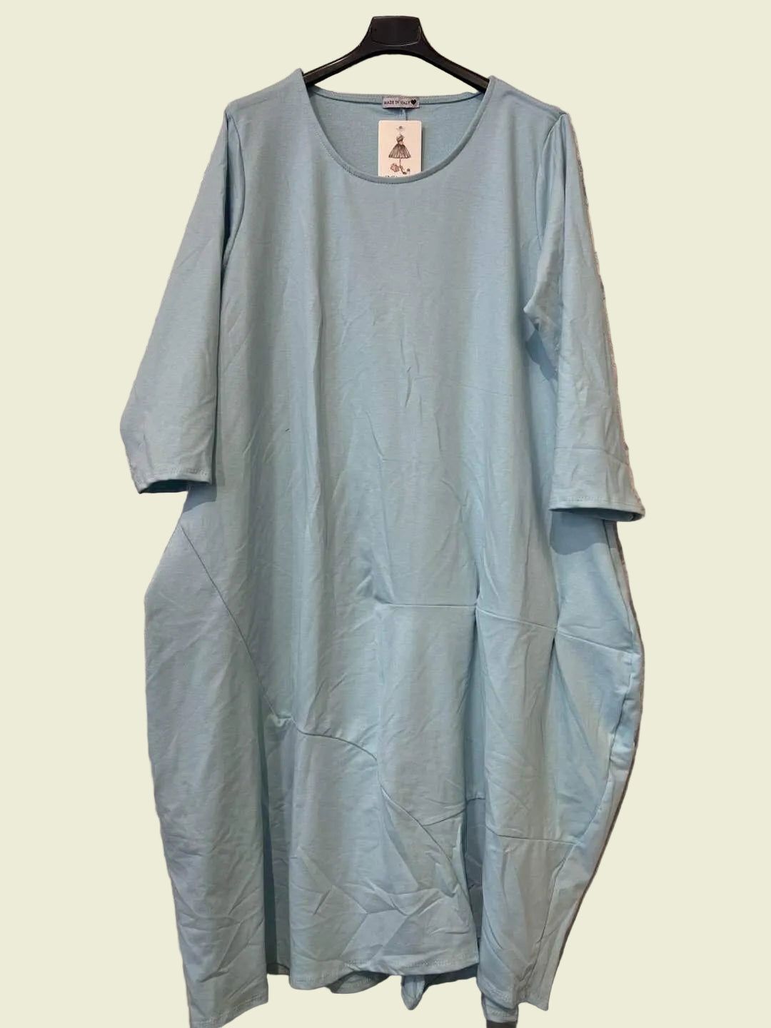 Light blue dress on a hanger 