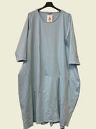 Light blue dress on a hanger 
