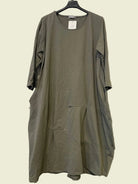 Green dress on a hanger 