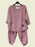 Pink outfit with a top and pants