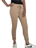 Person wearing tan jogger pants 