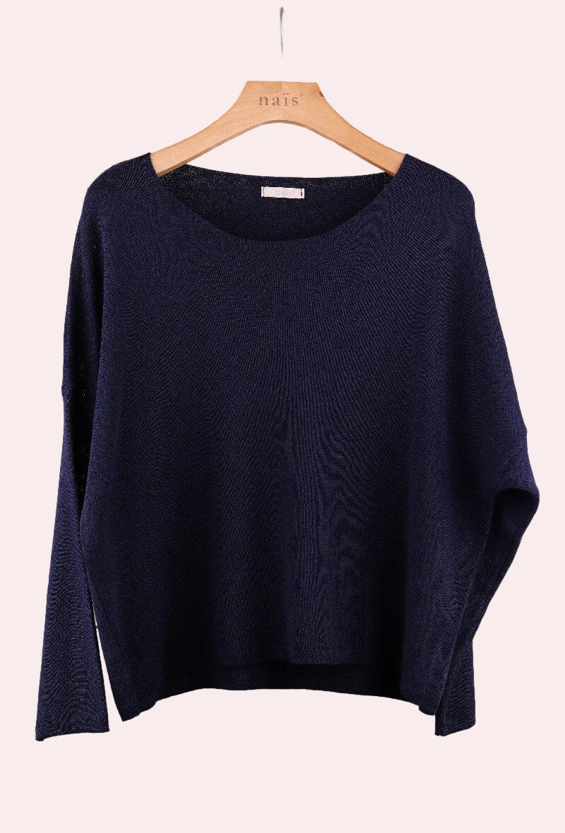 Navy blue sweater on a wooden hanger 