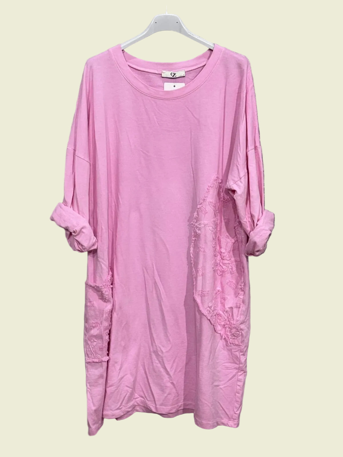 Pink dress on a hanger