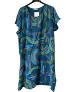 Blue dress with abstract pattern on a hanger 