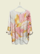 Floral patterned shirt on a hanger 