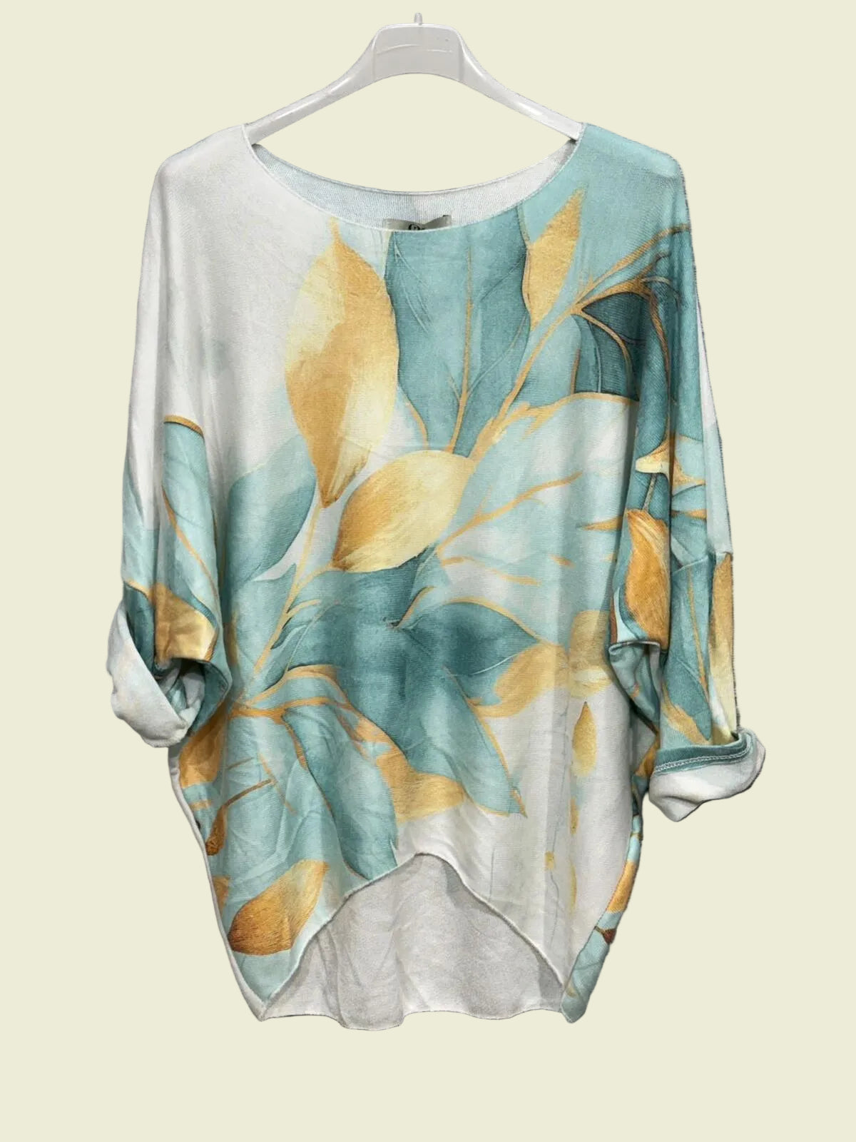 Floral patterned shirt on a hanger 