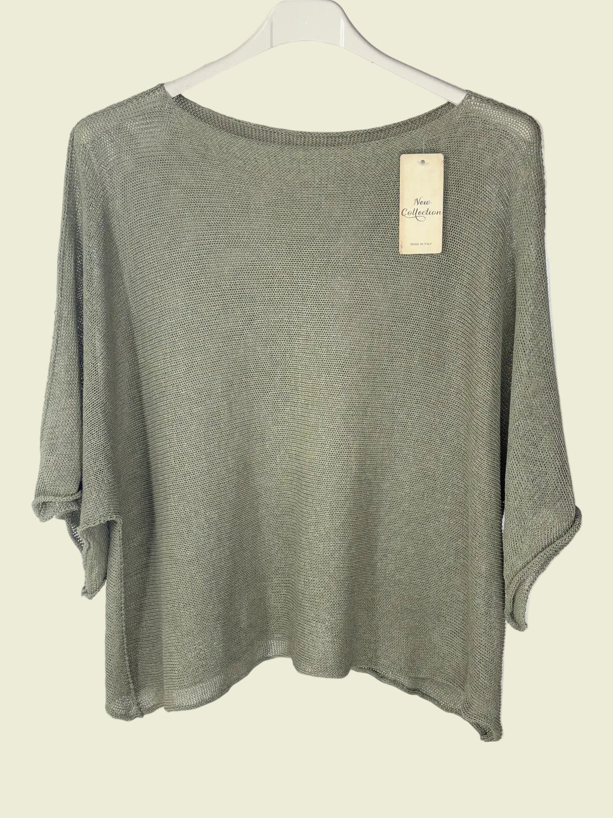 Khaki Green sweater on a hanger 