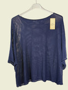 Blue top on a hanger 