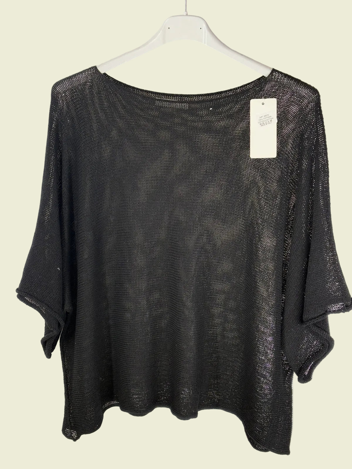 Black mesh top on a hanger