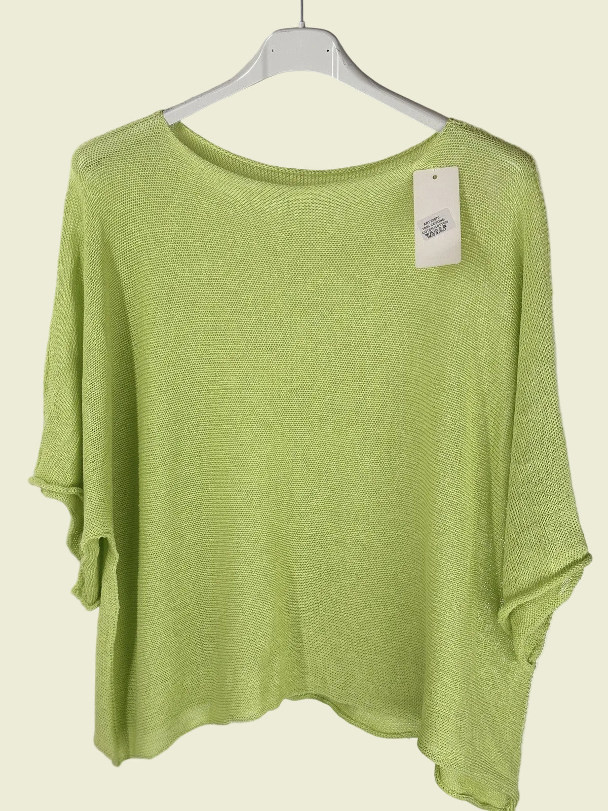 Light Green sweater on a hanger 