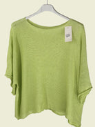 Light Green sweater on a hanger 